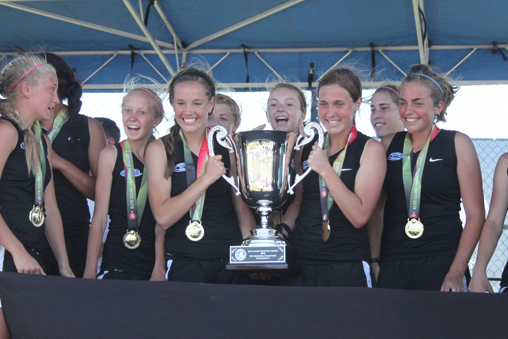 Colorado Rush celebrate with their ECNL U-15 national championship trophy