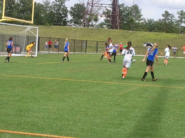 San Diego Surf U-14s (in blue) battle De Anza Force in the ECNL U-14 national semifinal in Midlothian, Va. on Sunday. Photo property of SoccerWire.com.