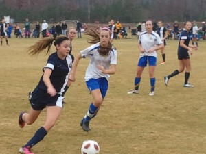 Mountaineer United Elite U-16s in action at the Capital Fall Classic (in blue).