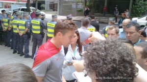 Matt-Besler-speaks-to-media-amid-heavy-security-in-Sao-Paulo