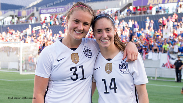 lindsey-horan-and-morgan-brian Strikers Logo