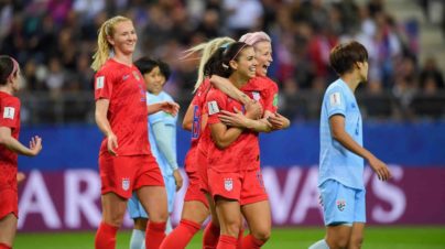 Alex Morgan and her U.S. women's teammates celebrate