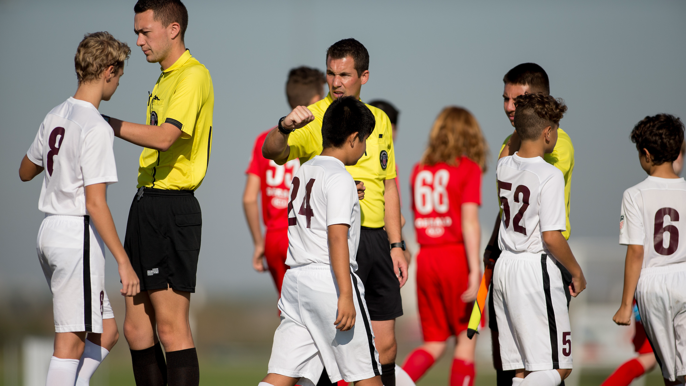 How youth soccer parents can help improve tournament referee quality